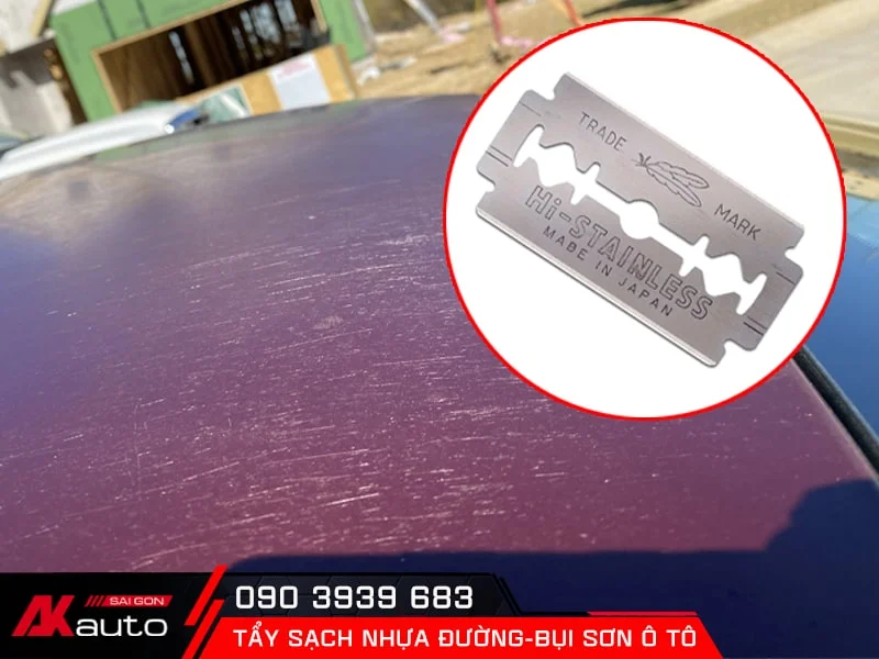 tẩy nhựa đường, bụi sơn bằng dao lam