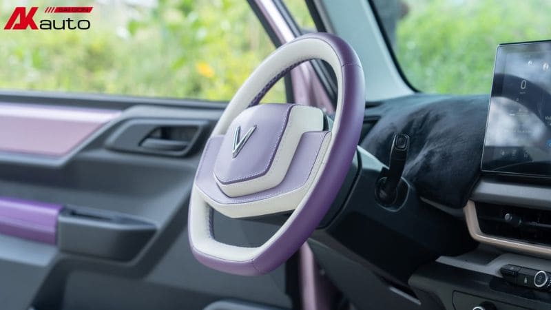 Bọc da cho vô lăng phối màu kem và tím